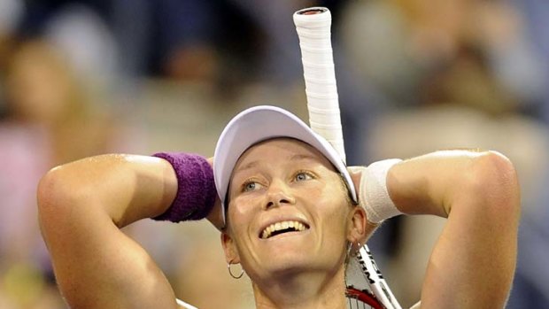 Samantha Stosur reacts after beating unseeded Angelique Kerber of Germany.