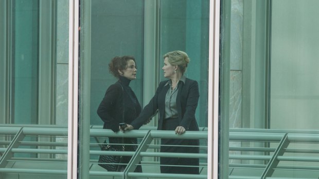 Sigrid Thorton as Lara Dixon, CEO of private cybersecurity film, and Robyn Malcolm as Minister for Foreign Affairs Marina Baxter at Parliament House in the second series of The Code.