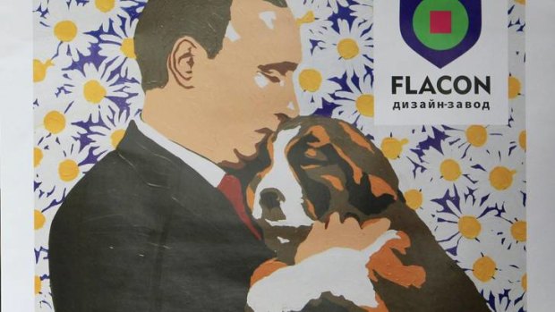 Animal lover ... Vladimir Putin is depicted in a poster at an exhibition by the artist Alexey Sergienko  to mark the president's birthday.