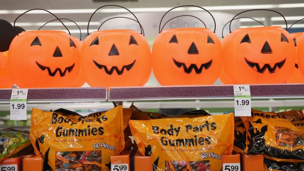 Halloween merchandise is offered for sale at a supermarket.