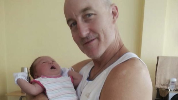 Kevin Lee, a former priest killed in Typhoon Haiyan, with daughter Michelle.