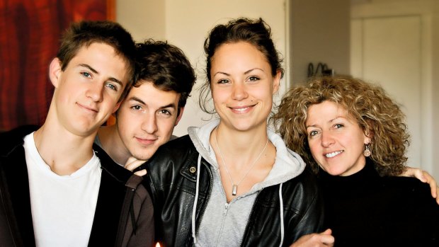 Phoebe Handsjuk with her brothers Nikolai (left) and Thomas and her mother Natalie.