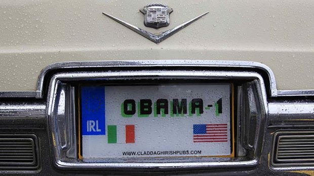 A number plate bearing the name of  US President Barack Obama is seen on a Cadillac in  Moneygall, Ireland.