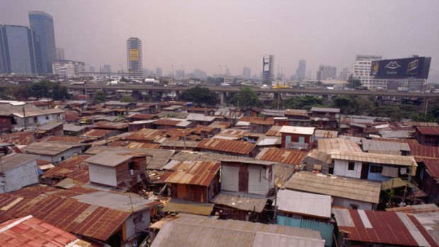 Home to 100,000 ... the tin roofs of the shacks of Klong Toey, Bangkok's shanty town.