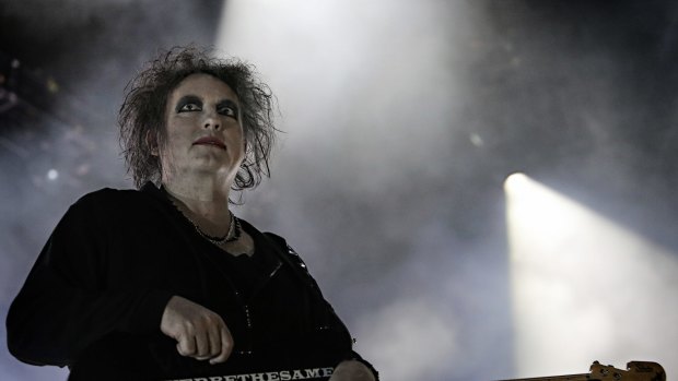 Robert Smith's distinctive ghostly white face, red lips and shock of wild black hair was as quintessentially the Cure as any fan could hope to see.