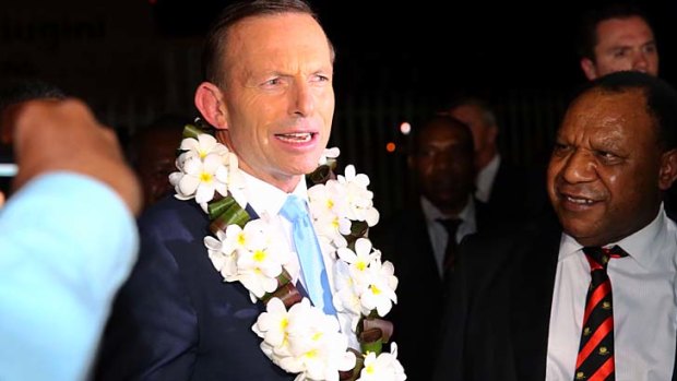 The arrival of Prime Minister Tony Abbott in Port Moresby.