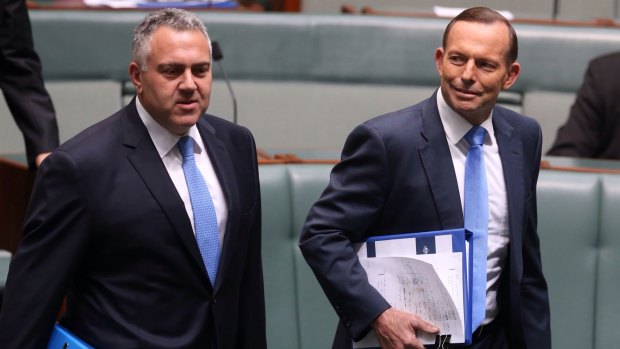 Prime Minister Tony Abbott and Treasurer Joe Hockey arrive for question time at Parliament House.