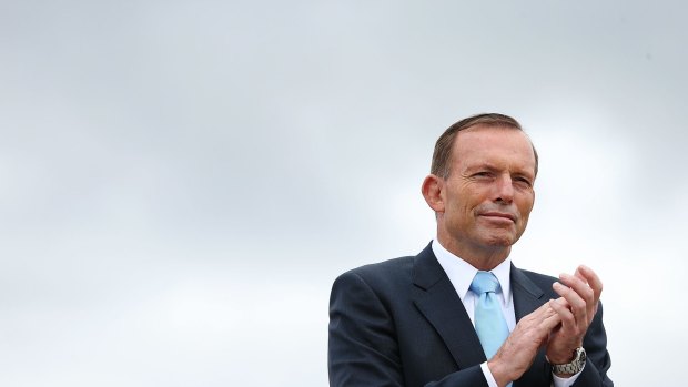 Prime Minister Tony Abbott at the flag raising and citizenship ceremony on Australia Day this year.