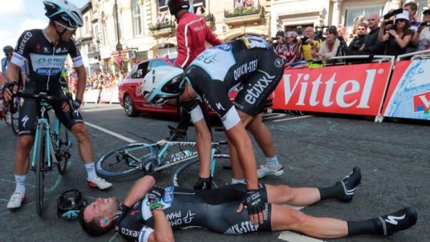 Down and probably out: Mark Cavendish.