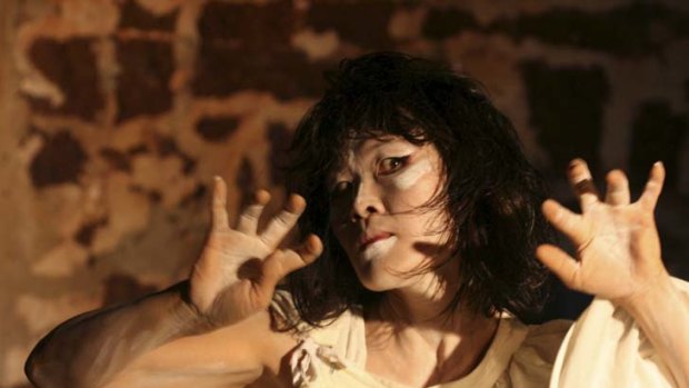 Yumi Umiumare ... her long background in the Japanese butoh dance tradition fires her moves and gestures.