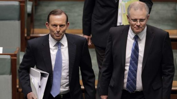 Wake up call: Prime Minister Tony Abbott and Minister for Immigration Scott Morrison.