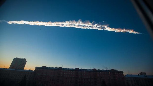 A meteorite contrail is seen over the Ural Mountains' city of Chelyabinsk.