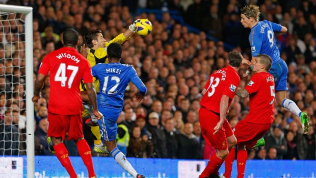 Liverpool keeper Brad Jones collects a header from Chelsea's Fernando Torres last month.
