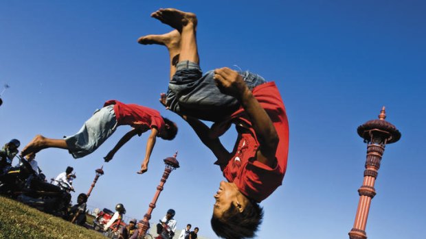 Tiny Toones dancer 13-year-old Vy practising flips at Hun Sen Park, Phnom Penh.