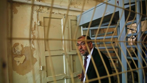 The Mayor of Hebron, Tayseer Abu Sneineh, passes through an Israeli checkpoint to visit an Israeli-controlled part of the West Bank city of Hebron.