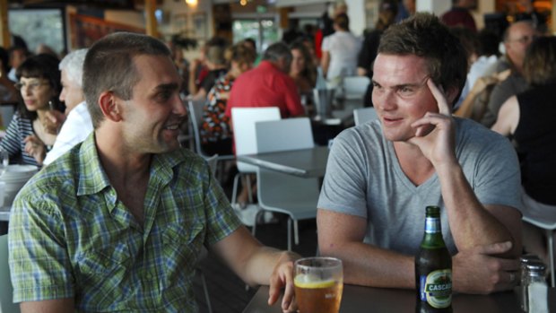 Chris Raine (right) who quit drinking alcohol for a period of 12 months of his own choosing with friend David Hateley at the Mooloolaba Surf Club.
