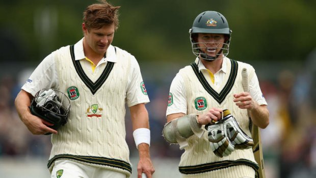 Shane Watson and Chris Rogers of Australia leave the field at the lunch break.