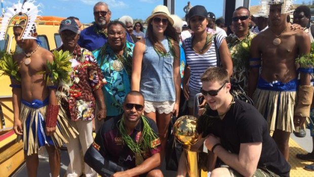Warm welcome: Patty Mills and Aron Baynes were overwhelmed by the reception they received from the locals at Mills' ancestral home in the Torres Straight Islands.