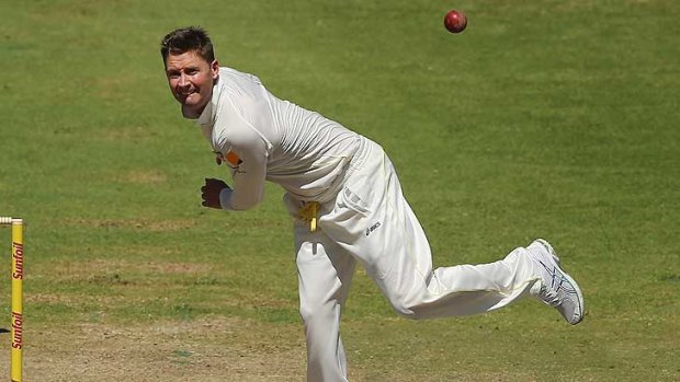 Michael Clarke of Australia bowls during day 5 of the third test match between South Africa and Australia.