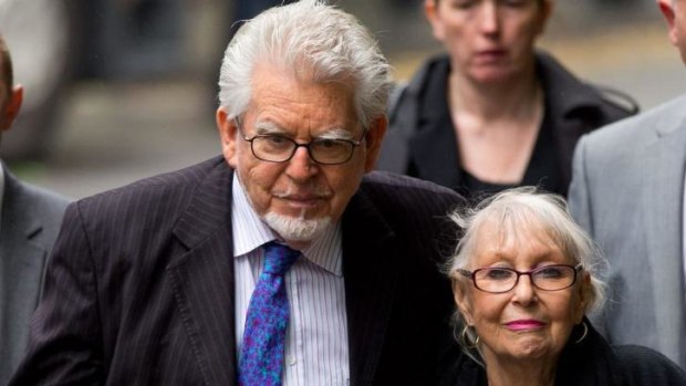 Key supporter ... Artist and television personality Rolf Harris arrives at Southwark Crown Court with his wife Alwen Hughes.