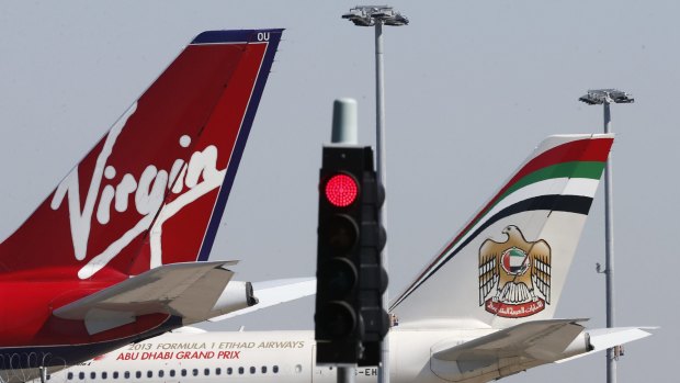 Etihad Airways is yet to decide whether it will back Virgin's $852 million share raising