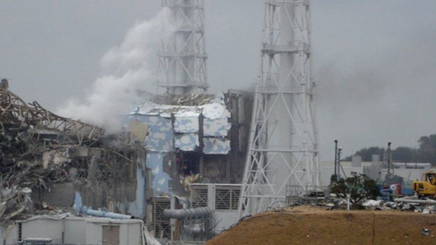 A handout photo shows Tokyo Electric Power Co. Fukushima Daiichi Nuclear Power Plant reactor no. 4 (centre) and no. 3 (left).
