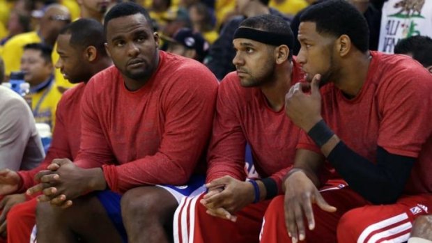 Silent protest: Clippers players Glen Davis, left, Jared Dudley, centre, and Danny Granger refuse to wear the team's uniform off the court.