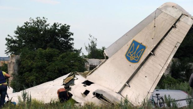 The wreckage of a Ukrainian AN-26 military transport plane after it was shot down by a missile.