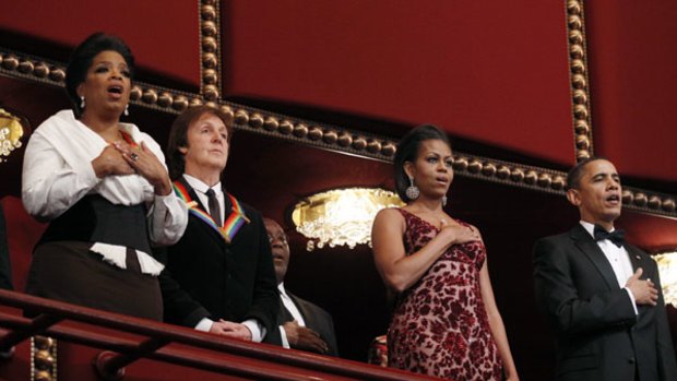 Oprah Winfrey and Paul McCartney are honoured at a Washington gala attended by Michelle and Barack Obama at the weekend.