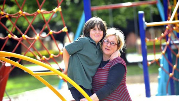 Angela Hickey, with her seven-year-old son Dante Hickey-Sorbello, is worried about the school system for children with autism.