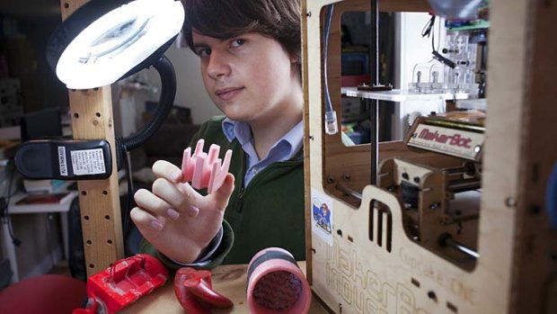 Christopher Olah, 19, a Thiel Fellowship recipient, with a 3D printer and printed objects he designed, in Toronto.