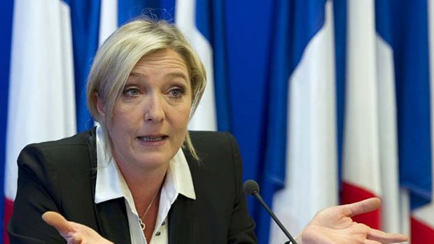 Marine Le Pen, leader of the right-wing National Front, says she might ask "all the French people" to help secure the party's headquarters after a bank demanded its seizure.