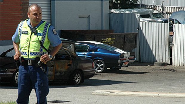 Police seized the blue and white vintage Ford Mustang at a Bayswater salvage yard yesterday.