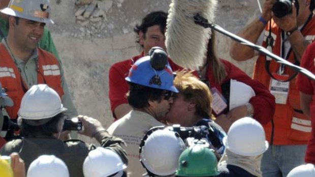 Chilean miner Yonni Barrios kisses mistress, Susana Valenzuela.