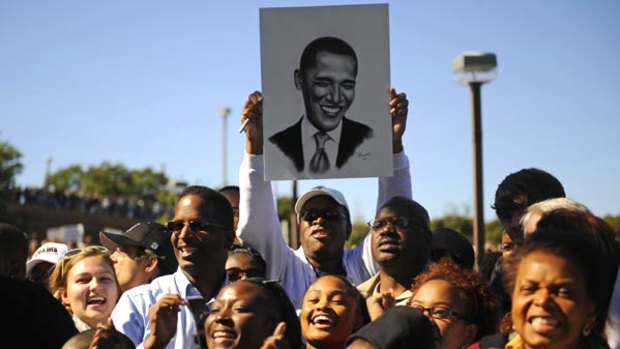 Barack Obama supporters cheer  at a rally in North Carolina. If Senator Obama wins the election, he will face immediate and intense political and economic pressures.