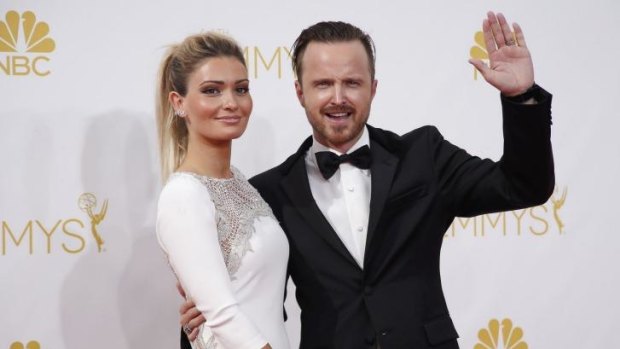 Aaron Paul and Lauren Parsekian arrive at the Emmys.