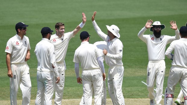 England bowler Chris Woakes dismisses Cricket Australia XI batsman Ryan Gibson.