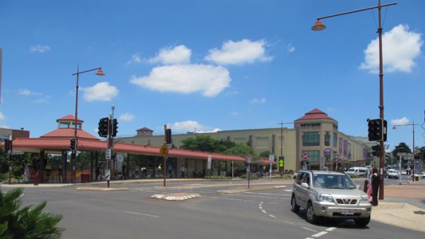 The intersection of Victoria and Margaret streets in Toowoomba, under blue skies.