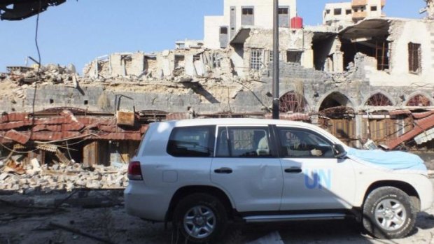 International effort: United Nations members arrive in Homs to supply humanitarian aid.