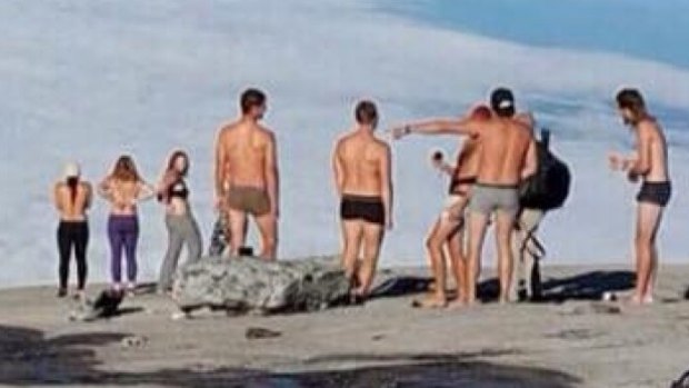 A photo posted to the Kinabalu Park Facebook page thought to show the 10 tourists who posed naked at Mt Kinabalu.