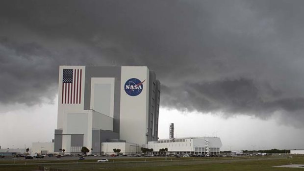 Dark clouds move over the Kennedy Space Center in Cape Canaveral.