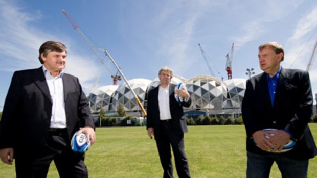 Melbourne Rebels president Gary Gray, CEO Brian Waldron and owner Harold Mitchell outside Melbourne's new rectangular stadium in March.