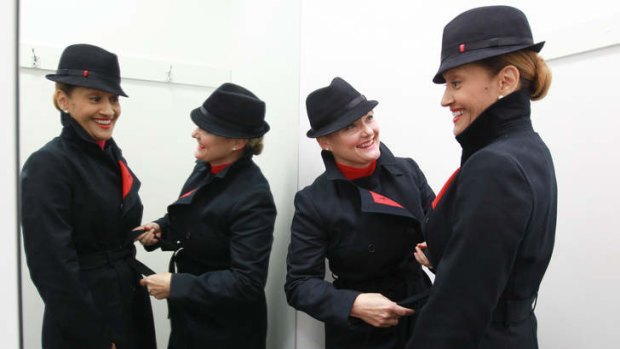Qantas employees Sharon Ashcroft and Albertina Hill wearing their new uniforms.