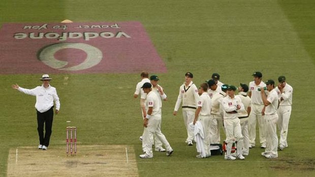 The moment ... umpire Billy Bowden  indicates a no-ball and brings to an end the Australians’ celebration of  what they thought was Michael Beer’s capture of Alastair Cook’s wicket.