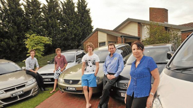Michael, Shane, John and their parents, Mark and Lynette Rowe, have five cars because of poor public transport services.