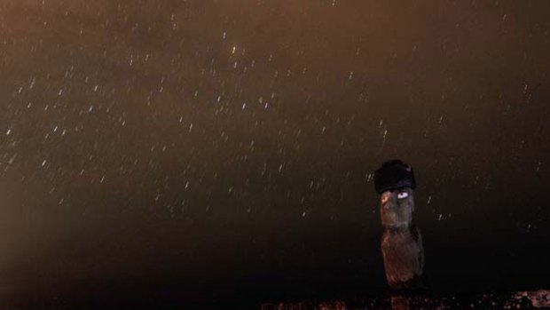 Night picture of a Moais - stone statue of the Rapa Nui culture - on Easter Island, 3700 kilometres off the Chilean coast in the Pacific Ocean.