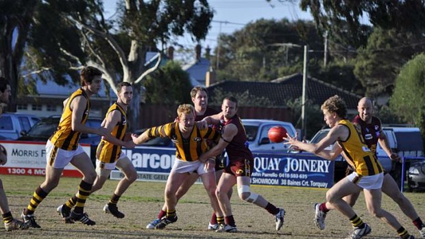 Renewed pride: Inverleigh players on the run against East Geelong. The Hawks' senior football team will today play its first finals match since the club was reborn.