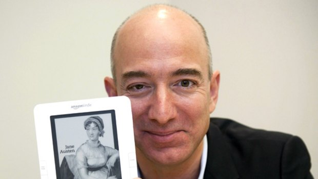 Amazon CEO Jeff Bezos shows off his baby.