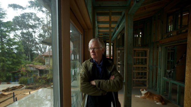 Architect Ross Young, in his half-built home in Katoomba.