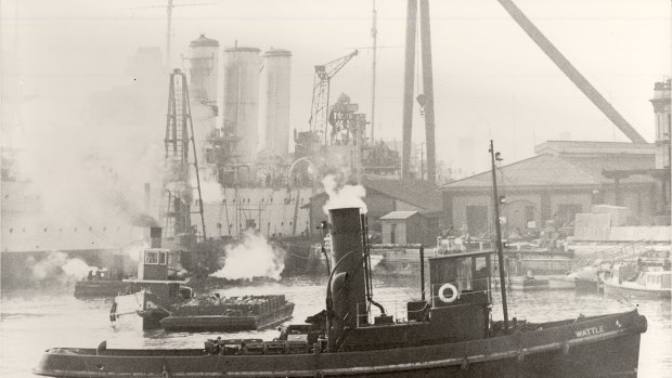 The Wattle in Sydney in 1963 with HMAS Australia in the background. 